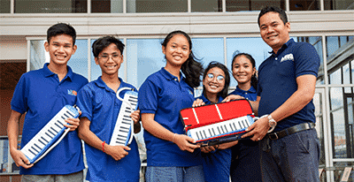 Student Support Unit donates 37 muscial instruments to Cambodian Children’s Fund Orphanage